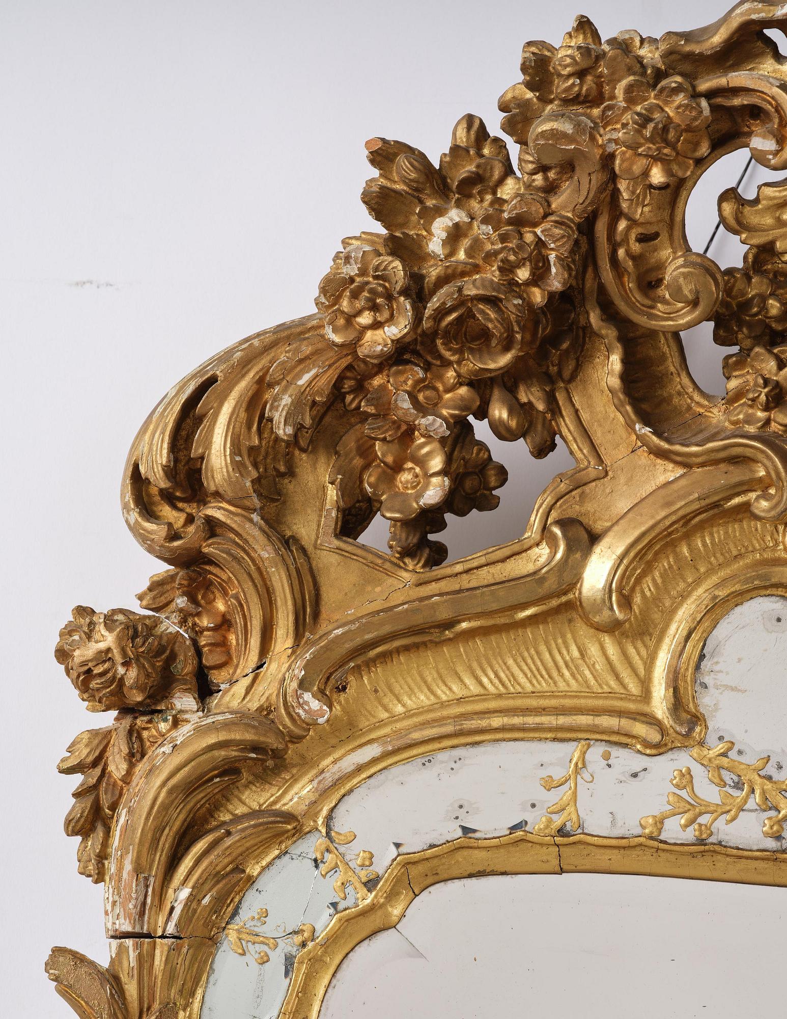 A giltwood rococo mirror, Stockholm, later part 18th century.