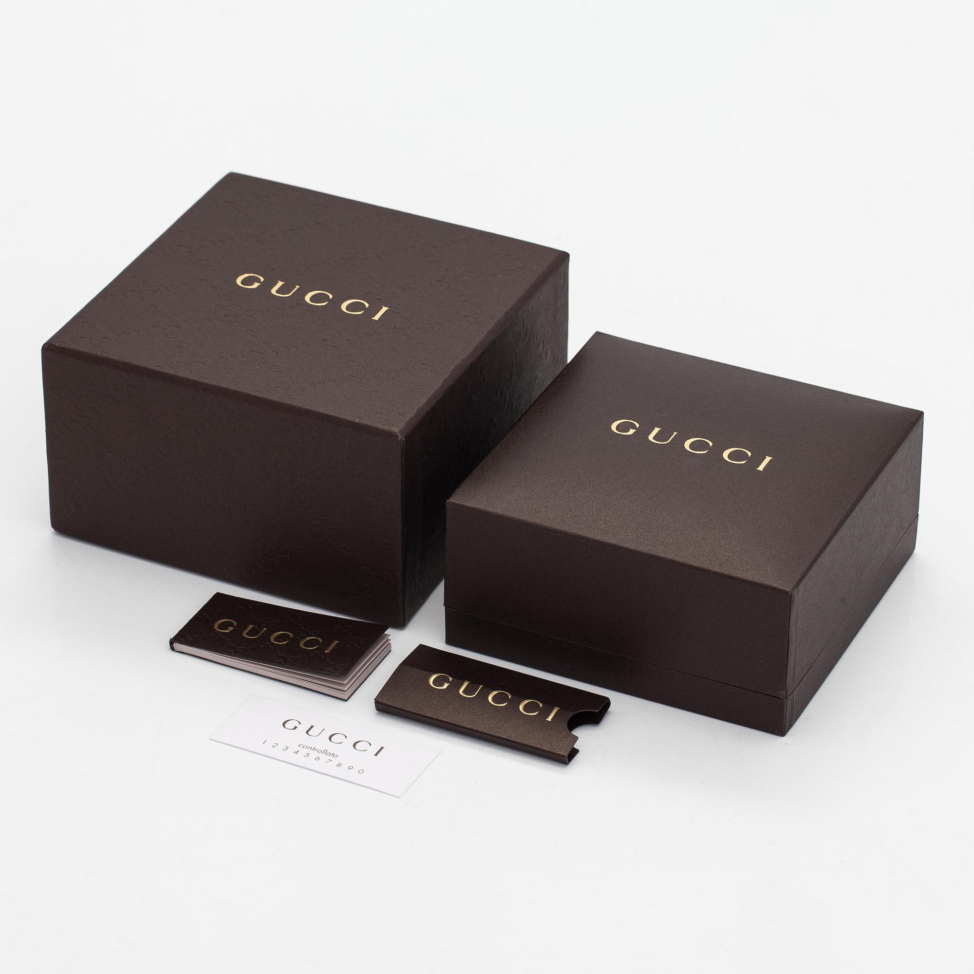 Gucci, an 18K white gold necklace with diamonds.