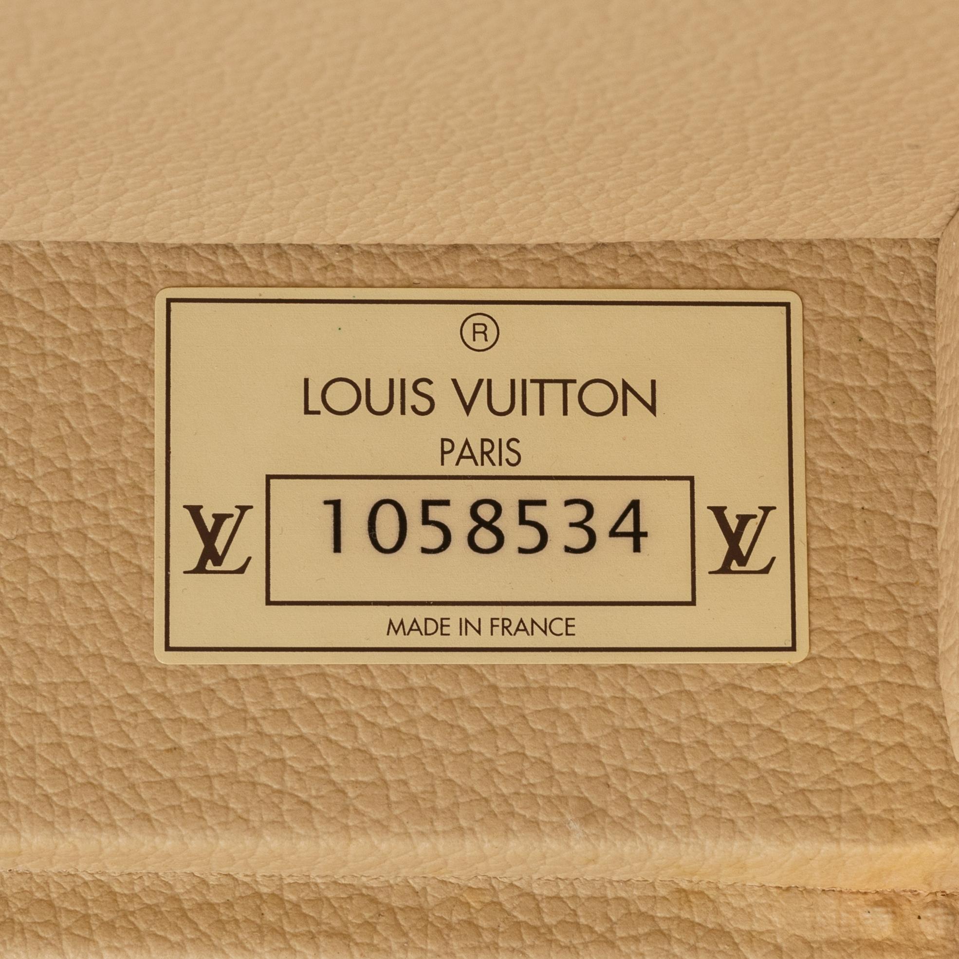 Louis Vuitton, A 'Alzer 60' travel bag, 2002.