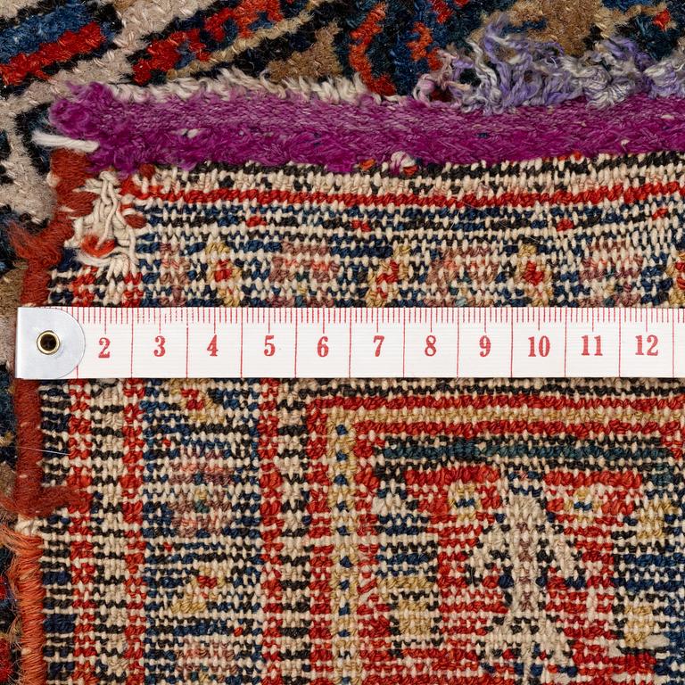 An antique Senneh rug, c 192 x 140 cm.