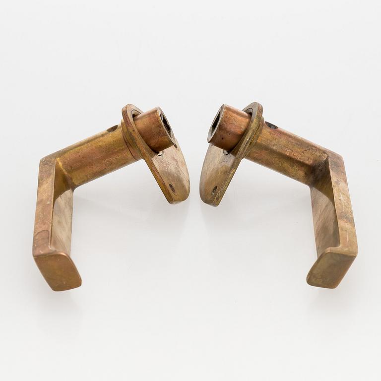 Dörrhandtag, 6 par, modell 75, tillverkare Mariefors Bruk. Modellen formgiven 1952.