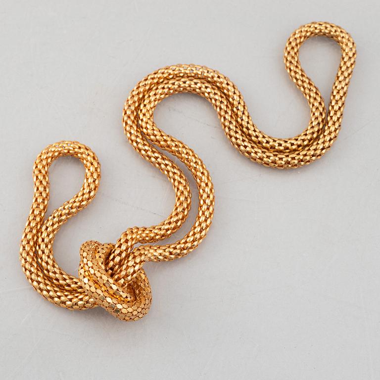 Lara Bohinc, a set of a necklace, ring, and bracelet.