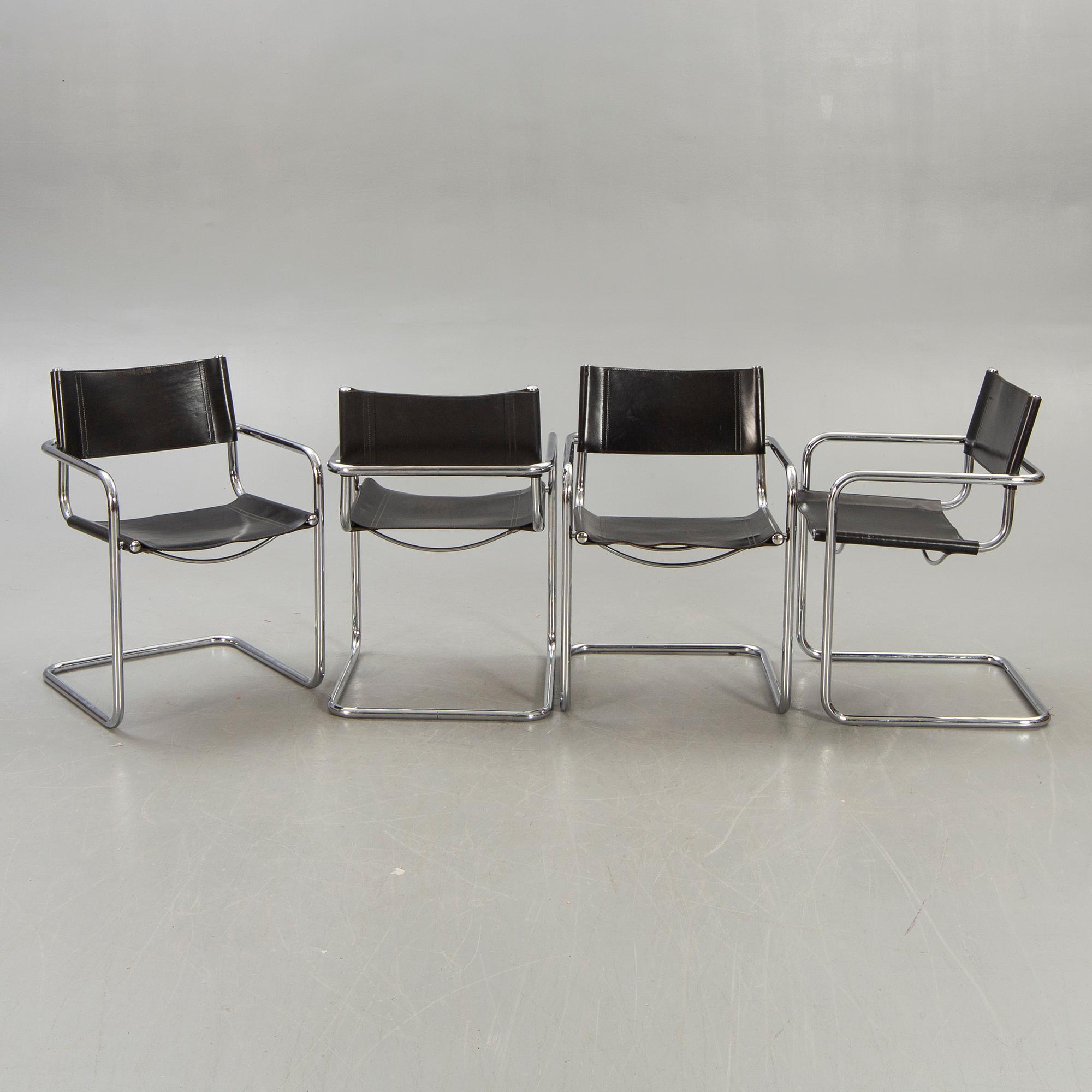 A set of four Italian chrome and leather chairs later part of the 20th century.