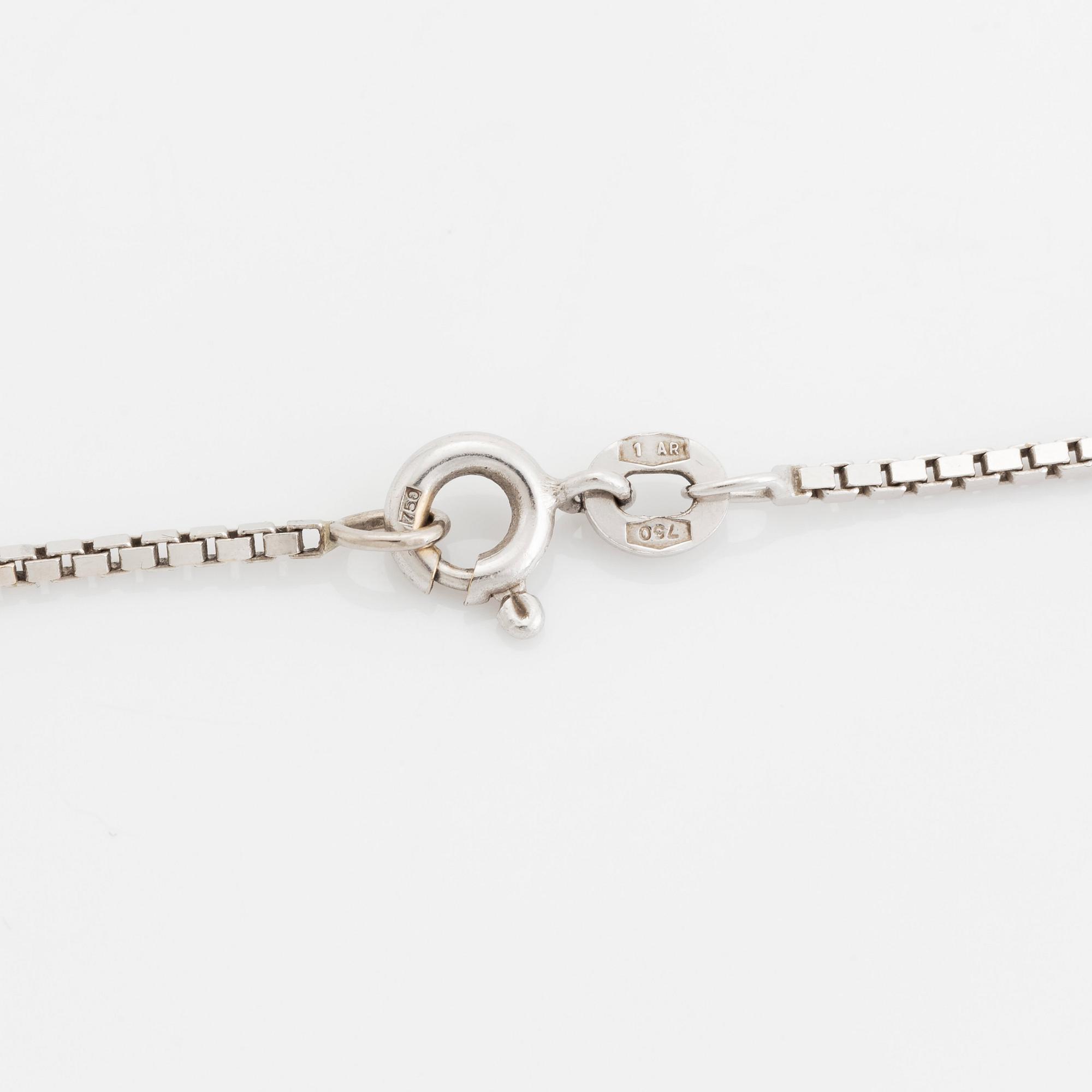 An 18K white gold pendant set with a round brilliant-cut diamond weight ca 3.50 cts quality ca H si.