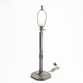 An early 1900s Art Noveau bronze table lamp.