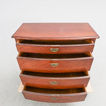 An early 1900s mahogany dresser.