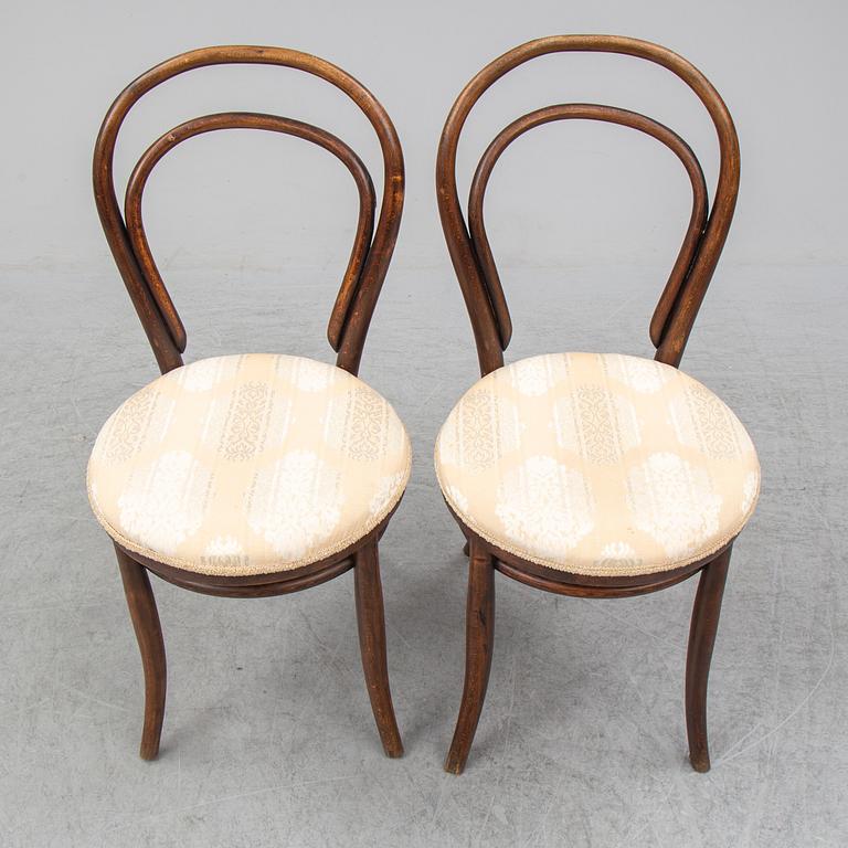 A pair of german chairs, early 20th century. Signed with labels.