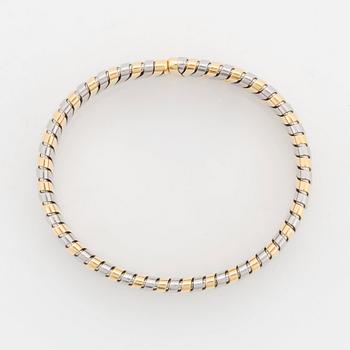 A Bulgari "Tubogas" bracelet in 18K gold and steel.