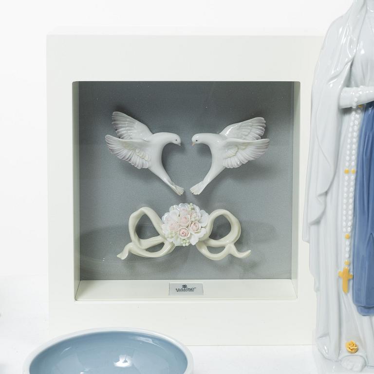 Lladró, a collection of figurines etc. Including "Romantic doves - wall art", "Sitting in heaven", "Our lady of Lourdes".