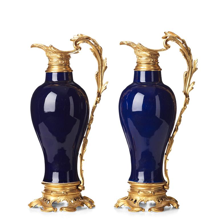 A pair of gilt bronze mounted vases, Qing dynasty, Qianlong (1736-95). French bronze mounts.