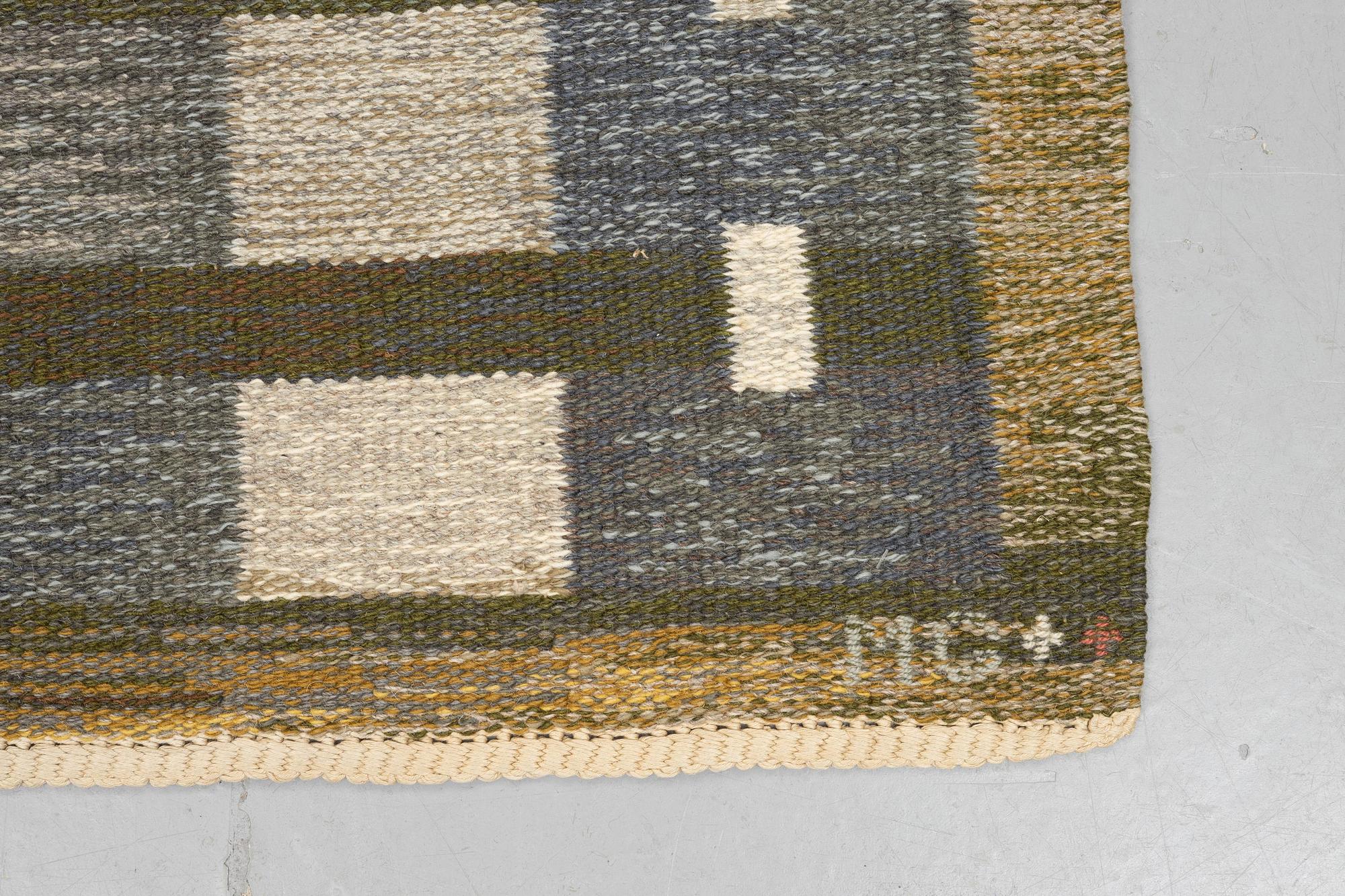 Margareta Grandin-Nettles, a carpet, flat weave, ca 249 x 167 cm, signed GLH MG.