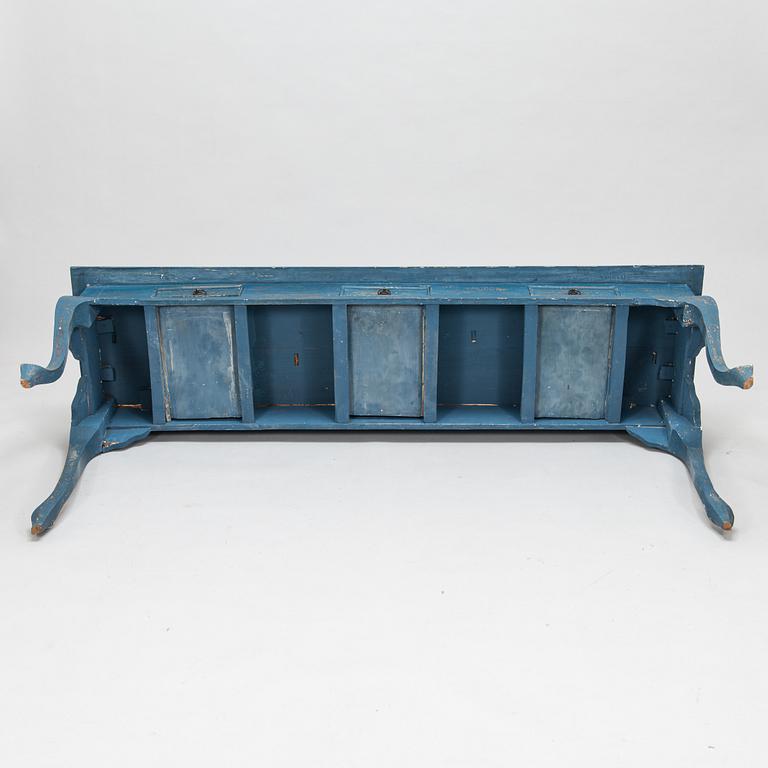 A 19th century rococo style sideboard.