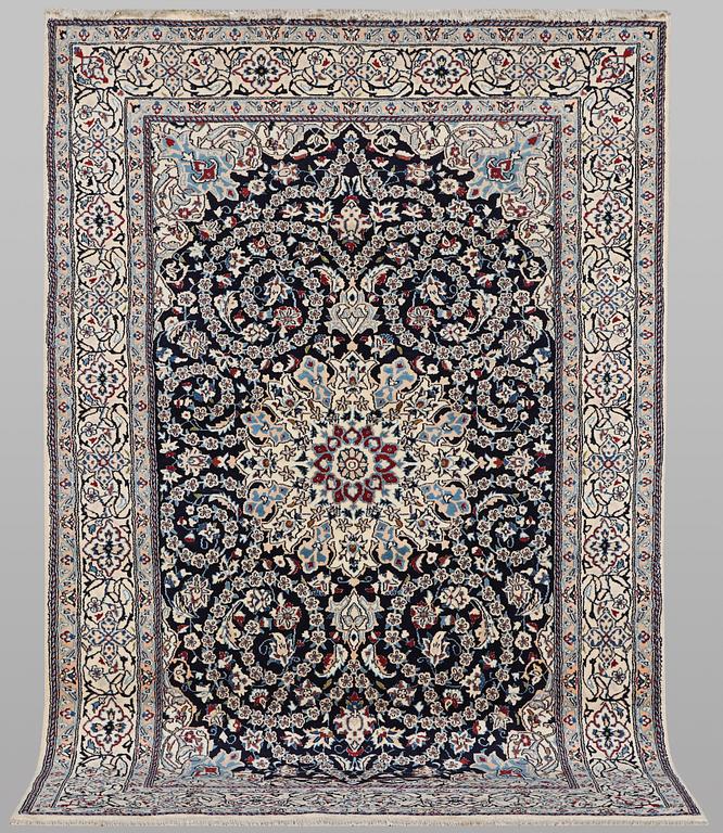A carpet, Nain, part silk, 9 Laa, ca 295 x 197 cm.