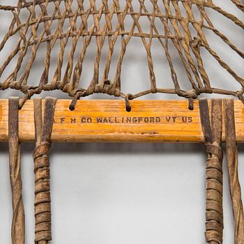A pair of snowshoes, F H CO Wallinford VT US. First half of the 20th century.