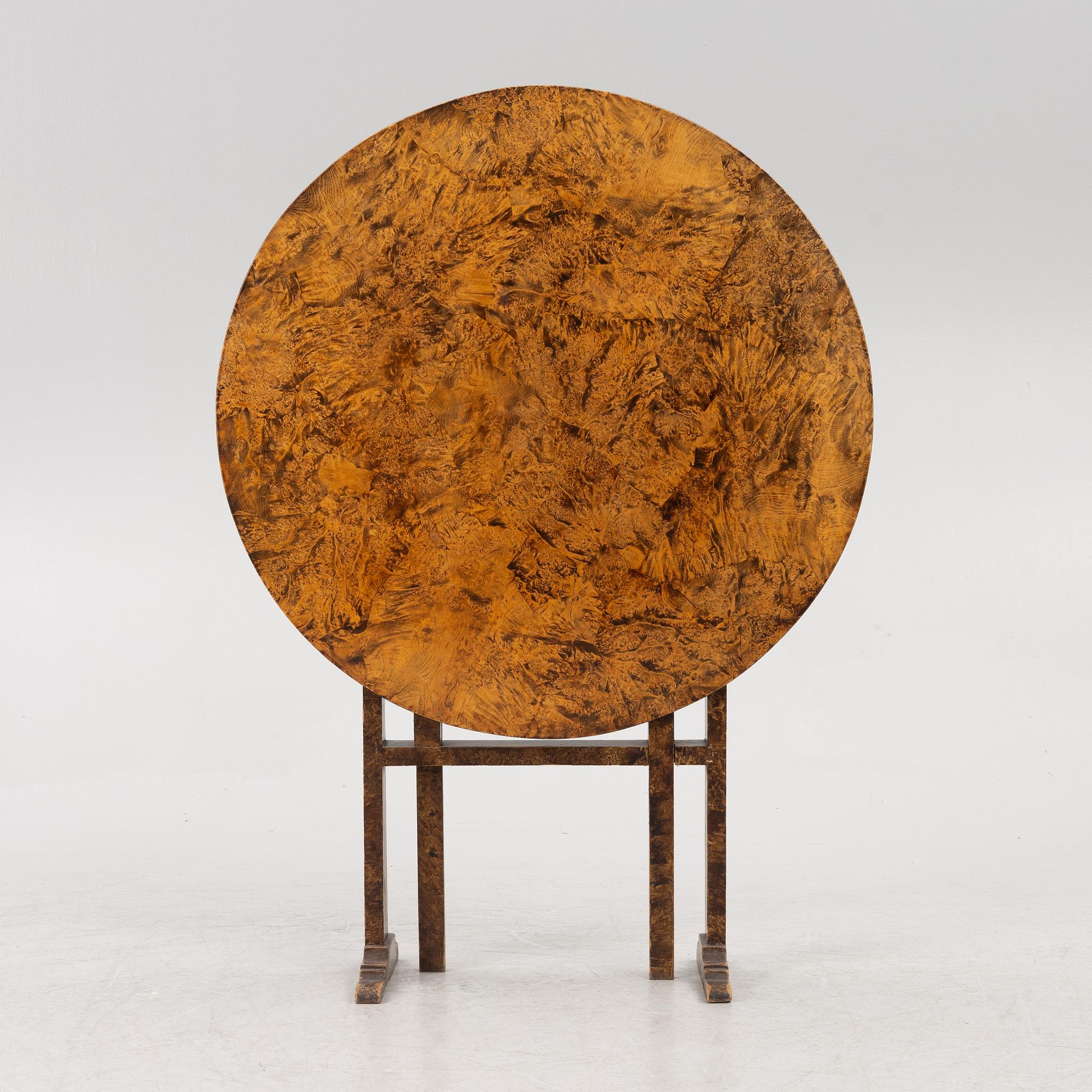 A folding table, 19th Century.
