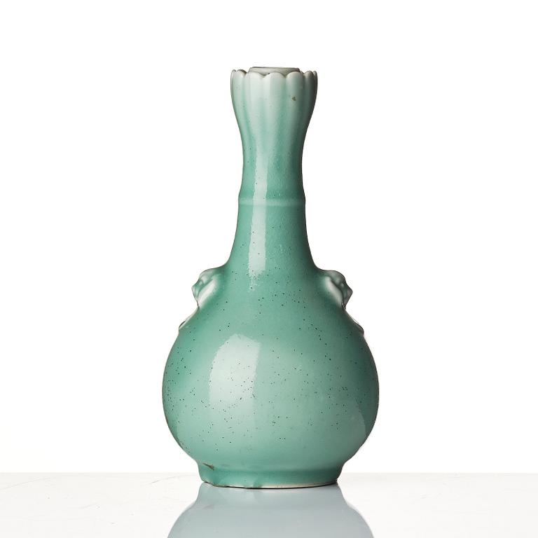 A celadon glazed vas, late Qing dynasty, with Yongzheng mark.