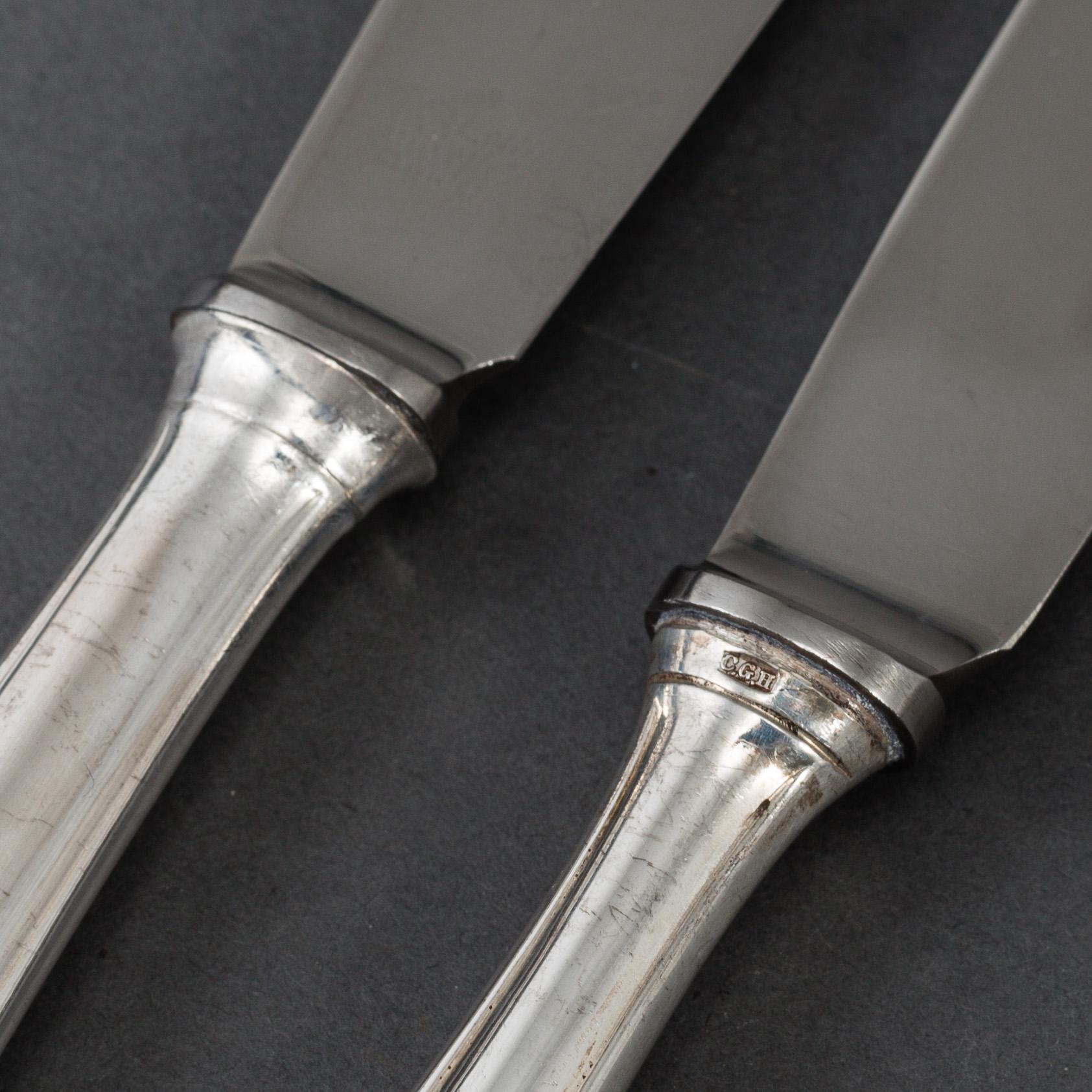 12 silver knives, model "Slottsbarock". Some CG Hallberg, Stockholm 1946.