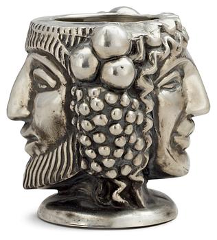 388. An Anna Petrus "Janus head" pewter vase by Svenskt Tenn 1993.