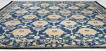 An antique Peking carpet, north China, c. 438 x 373 cm.