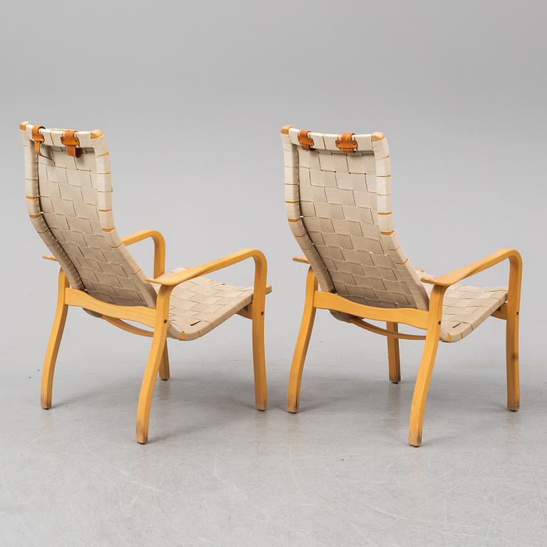 A pair of 'Primo' easy chairs by Yngve Ekström, for Swedese.