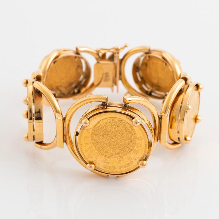 An 18K gold bracelet set with Mexican 22K gold coins.