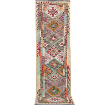 A runner carpet, Kilim, c. 287 x 83 cm.