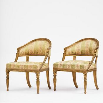 A pair of late Gustavian open armchairs attributed to E. Ståhl (master in Stockholm 1794-1820).