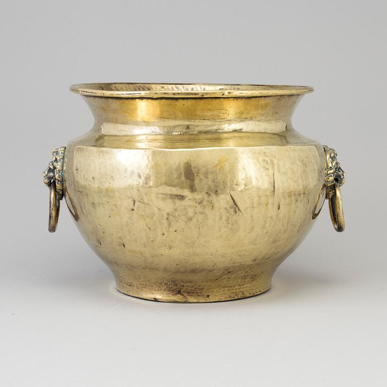 a 18th century brass flower pot.