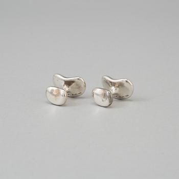 A pair of sterling cufflinks by Elsa Peretti for Tiffany & co.