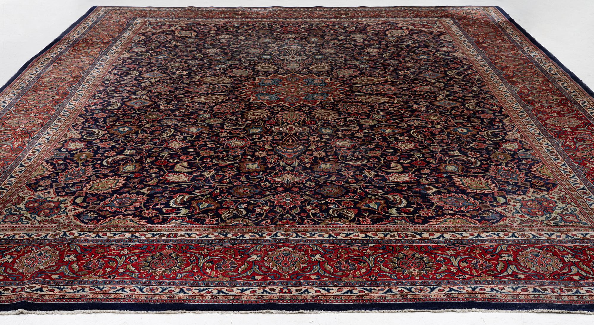 A Persian carpet, c. 445 x 320 cm.