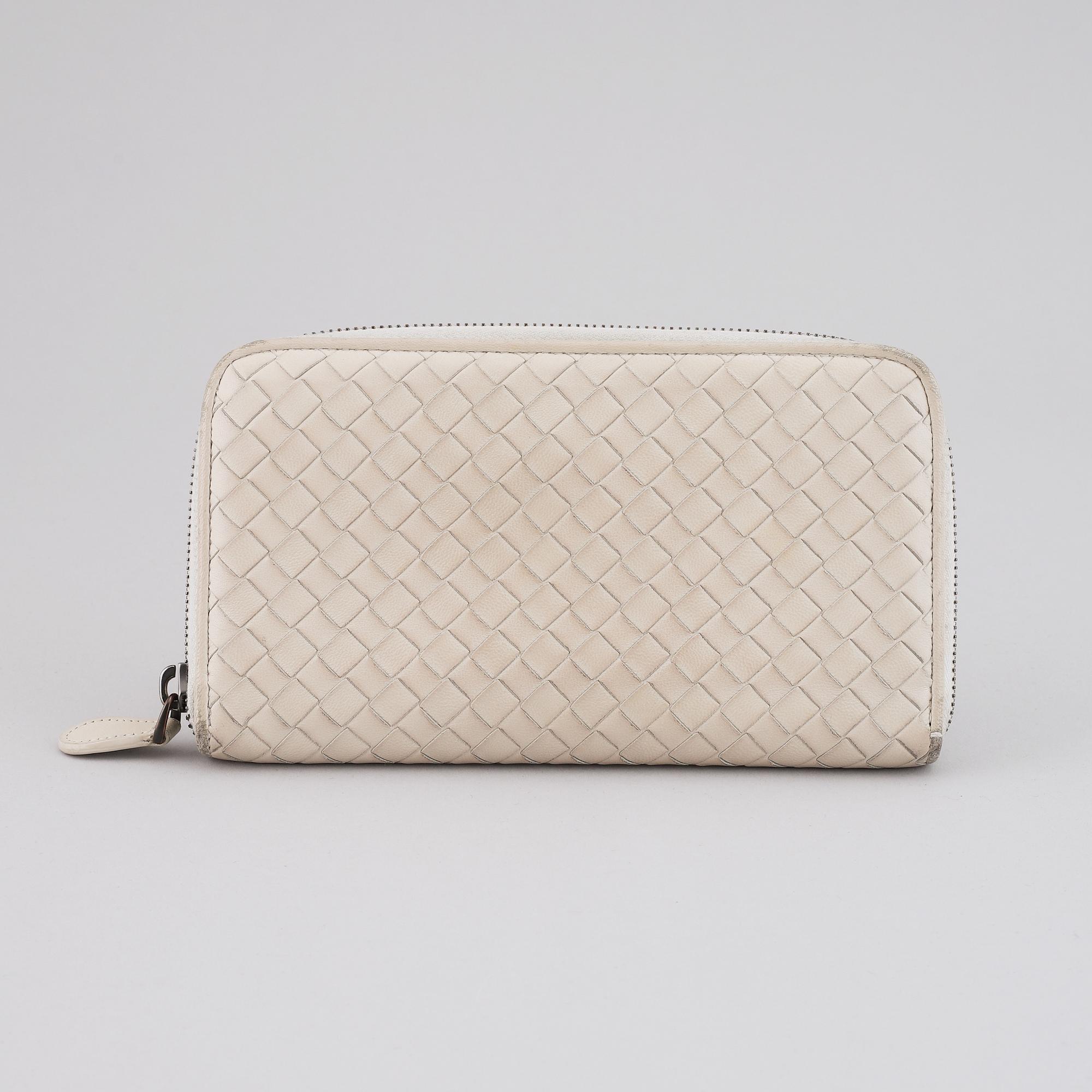 BOTTEGA VENETA, a intrecciato leather wallet.
