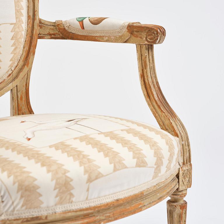 A pair of French Louis XVI children's open armchairs, late 18th century.