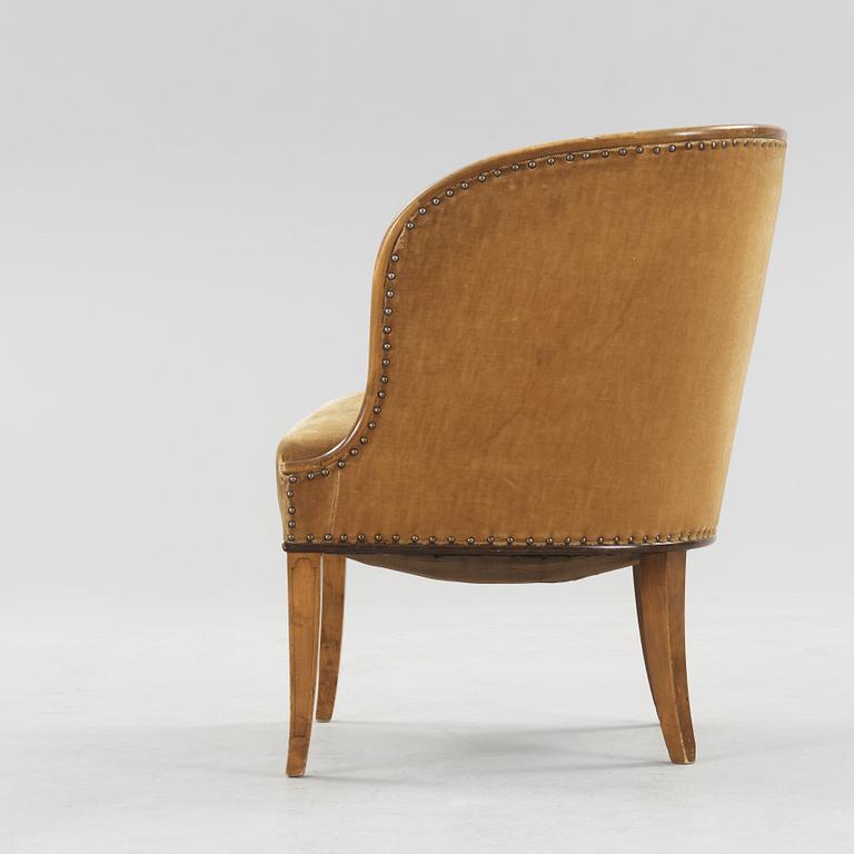 A Swedish Grace elm armchair, 'Bellman', attributed to Axel Einar Hjorth, Nordiska Kompaniet 1930.