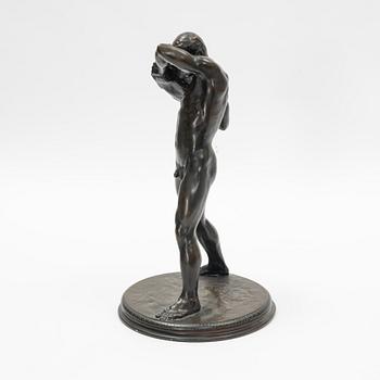 Poul Moye, after. Male athlet throwing a stone.