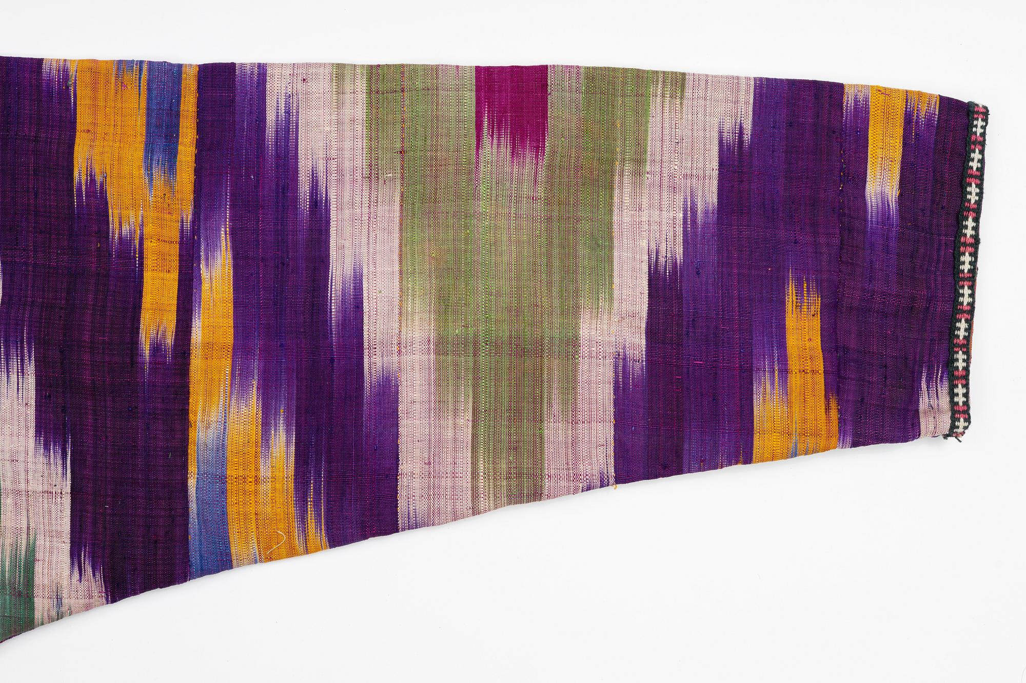 A silk Ikat Chapan, Central Asia, 1880s.