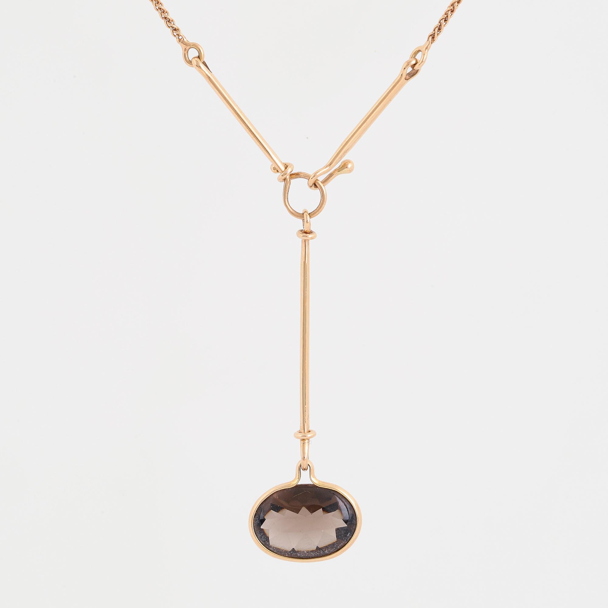GEORG JENSEN, a "Savannah" pendant set with an oval faceted smoky quatrz.