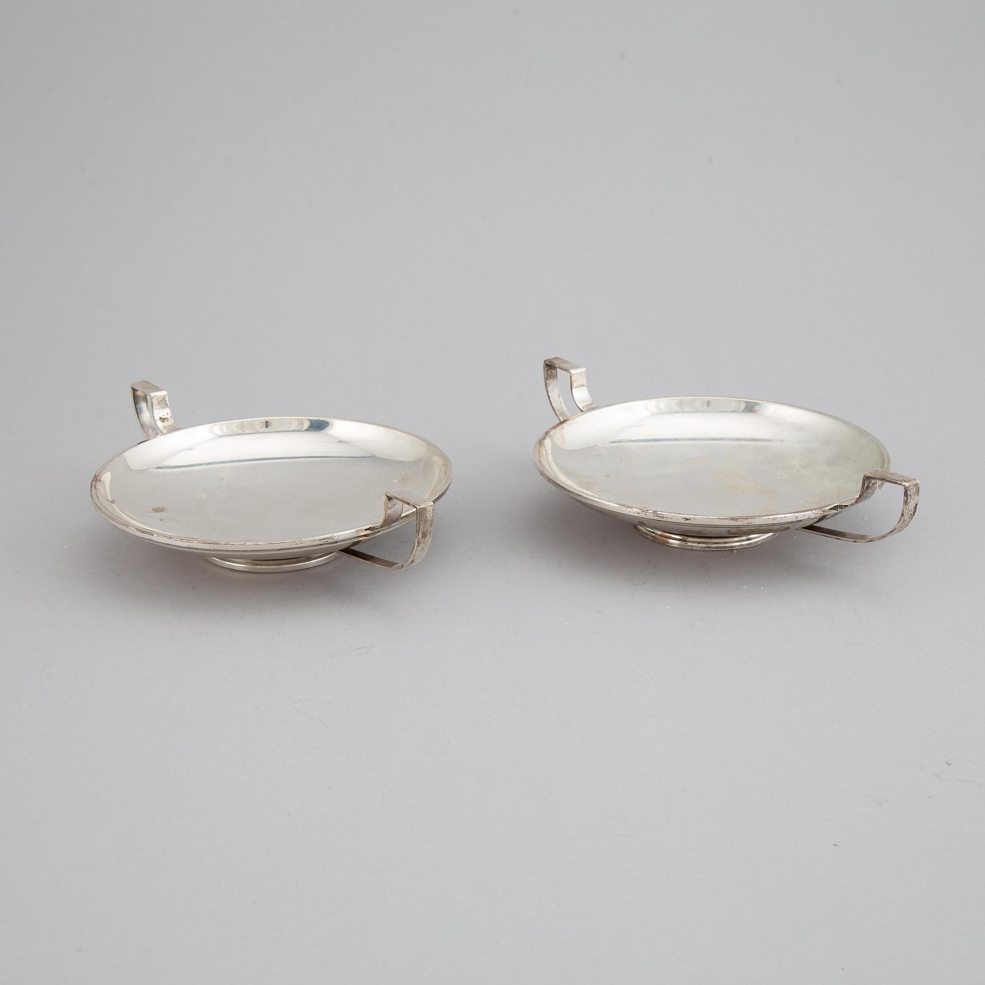 A pair of sterling silver tazzaz.