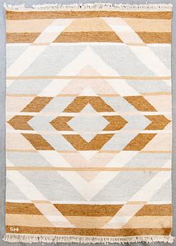 A flat weave carpet ca 240 x 170 cm.