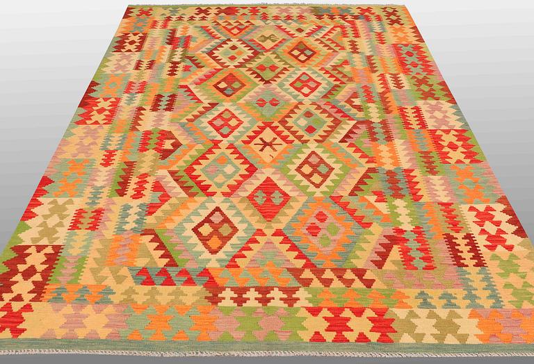 A CARPET, Kilim, ca 302 x 203 cm.