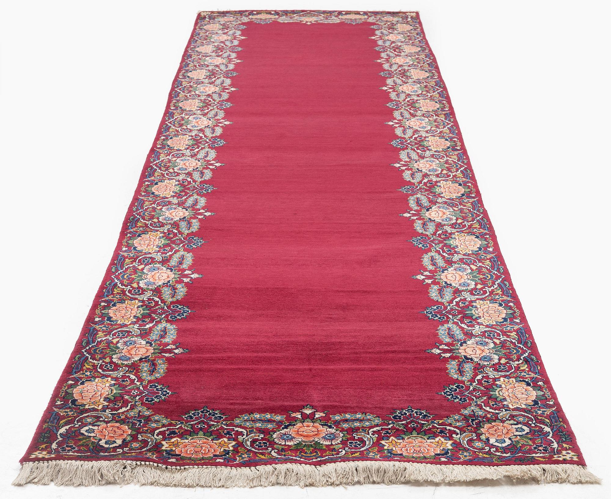 A semi-antique Keshan runner, c. 446 x 112 cm.