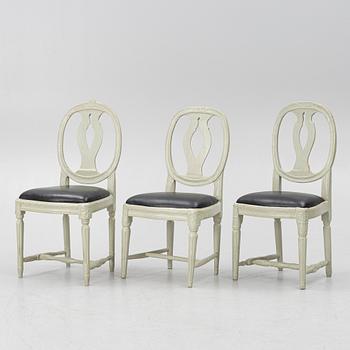 Ten similar Gustavian chairs, Sweden, around the year 1800.