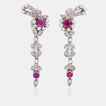 815. A pair of ruby and single- and brilliant-cut diamond earrings.