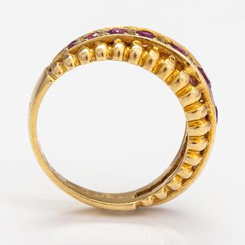 An 18K gold ring with rubies. Italy, finnish import marks.