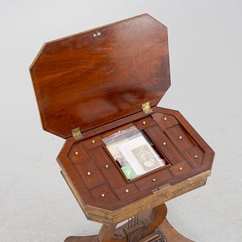 An Empire mahogany sewing table, First part of the 19th Century.