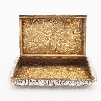 A Russian silver box with samorodok decoration and guilded inside, around 1900.