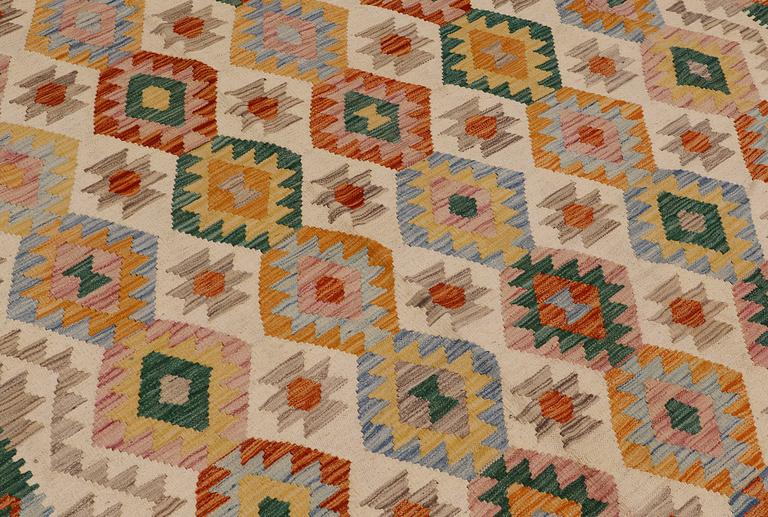 A carpet, kilim, ca 247 x 180 cm.