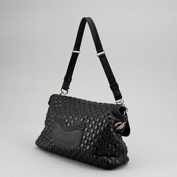 SONIA RYKIEL, a black leather bag.