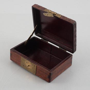Two Chinese hardwood boxes with nephrite plaques, 20th century.