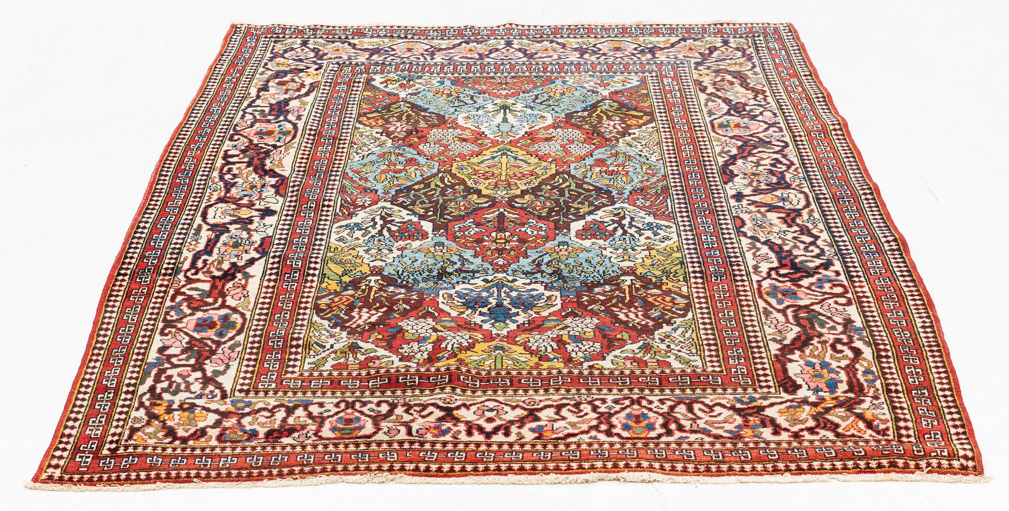 A semi-antique Mobarakeh-Esfahan rug, ca 206 x 144 cm.