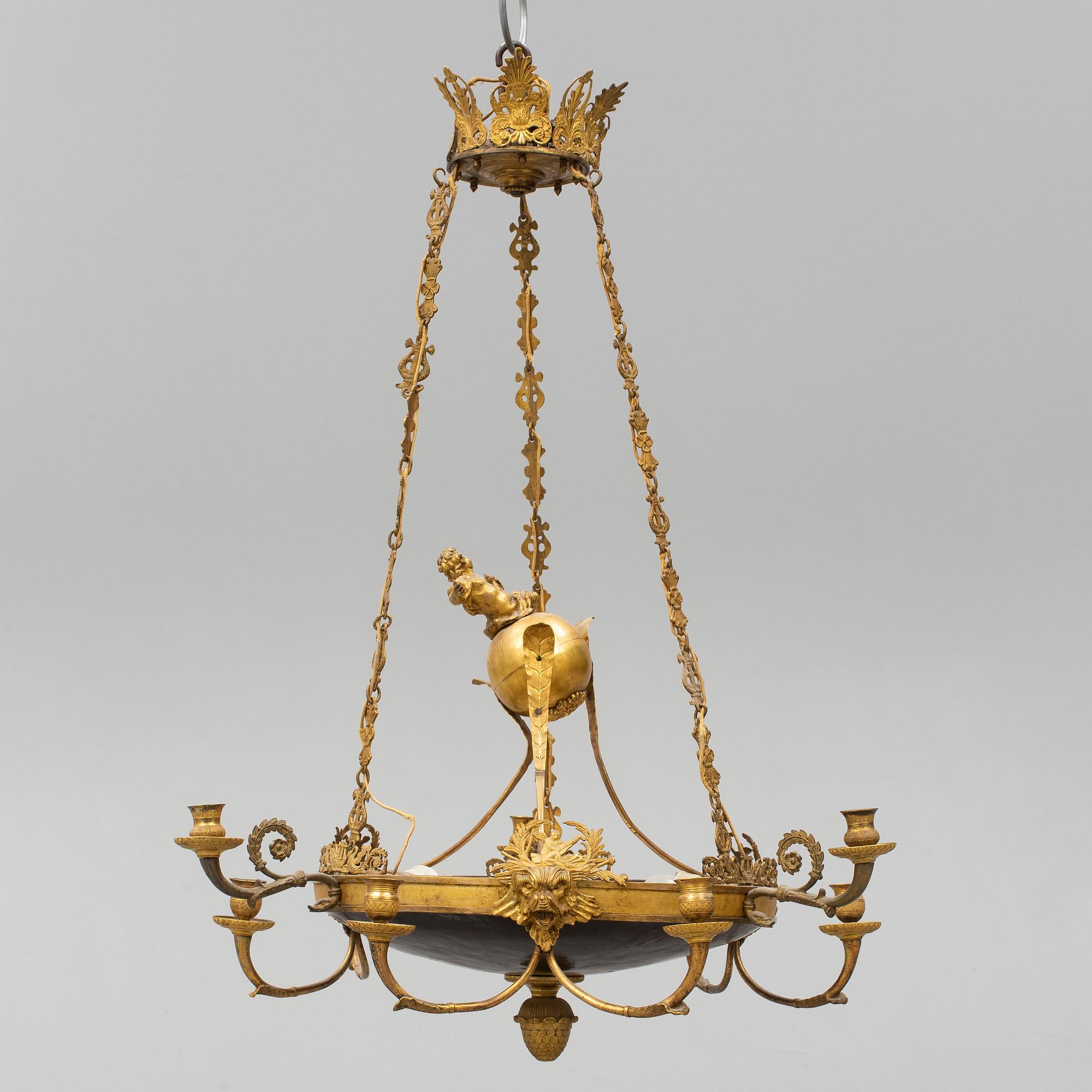 An Empire-style nine-light hanging lamp, late 19th century.